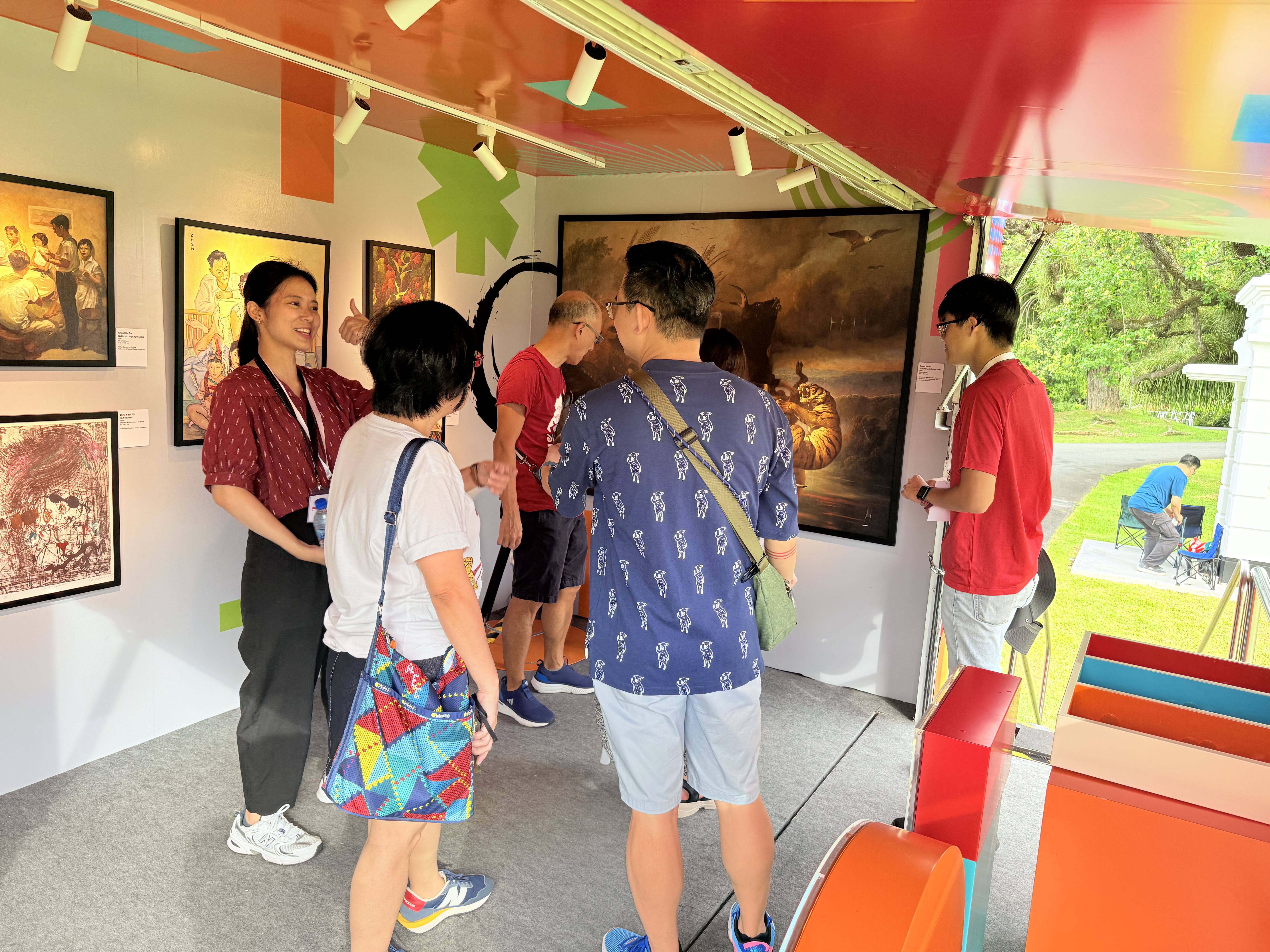 Visitors engage with art displays at the Istana Open House during Singapore National Day celebrations.