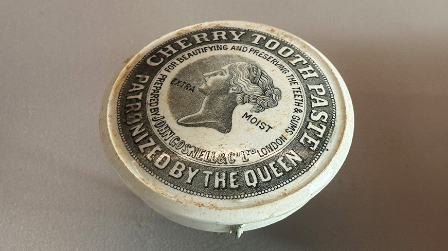 White earthenware lid of a toothpaste jar, c. late 1800s.