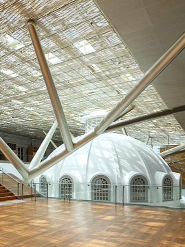 Full view of the former Supreme Court Terrace dome, with sunlight streaming through the rattan rooftop