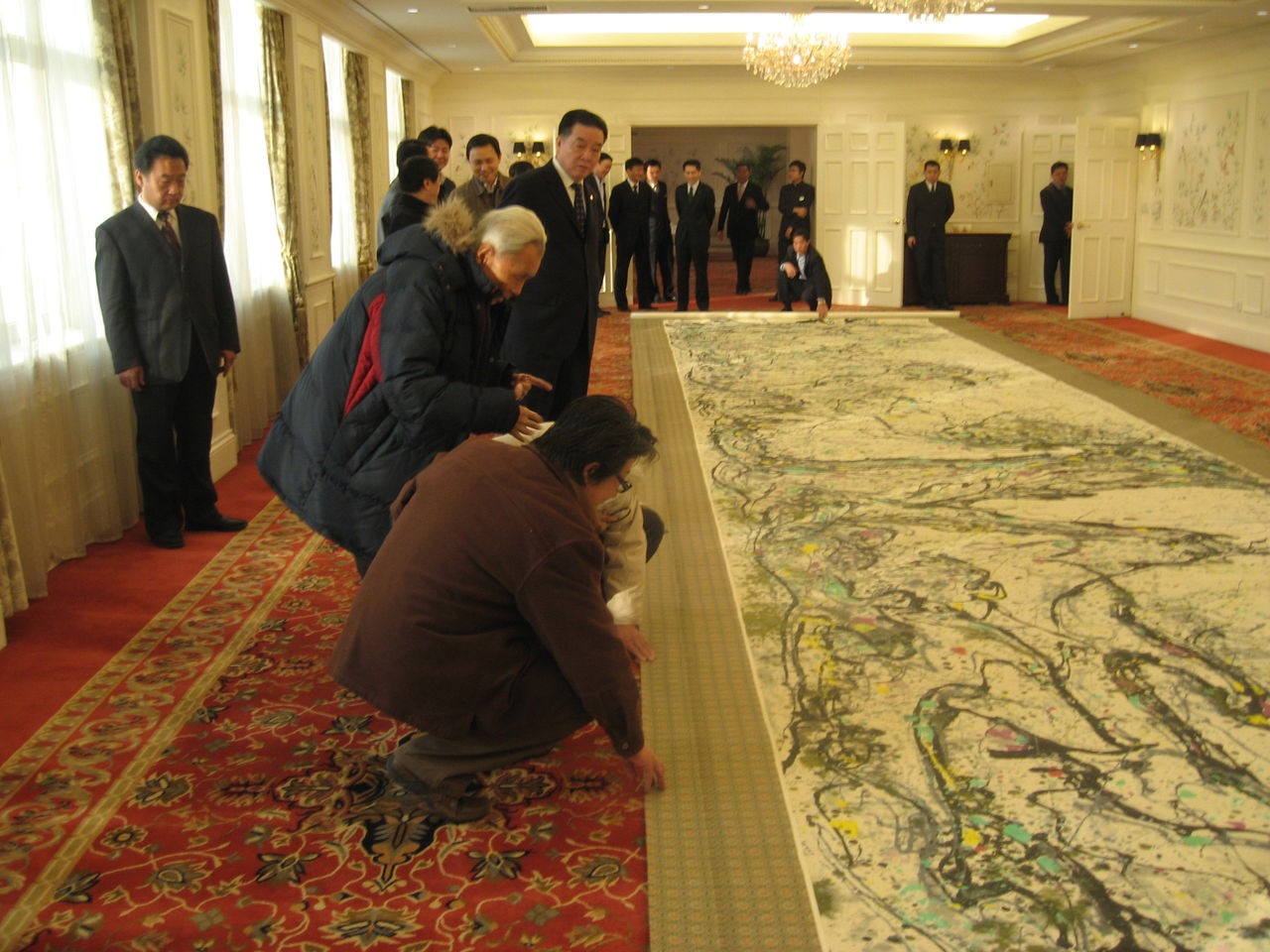Photograph of Wu Guanzhong and his 1989 work titled "清奇古怪"