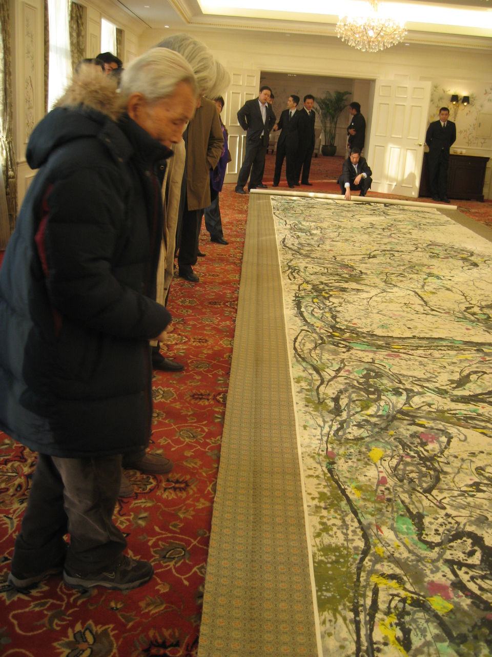 Photograph of Wu Guanzhong and his 1989 work titled "清奇古怪"