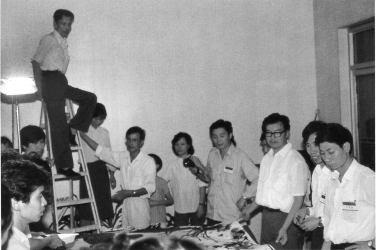 Photograph of Wu Guanzhong and other artists painting collectively