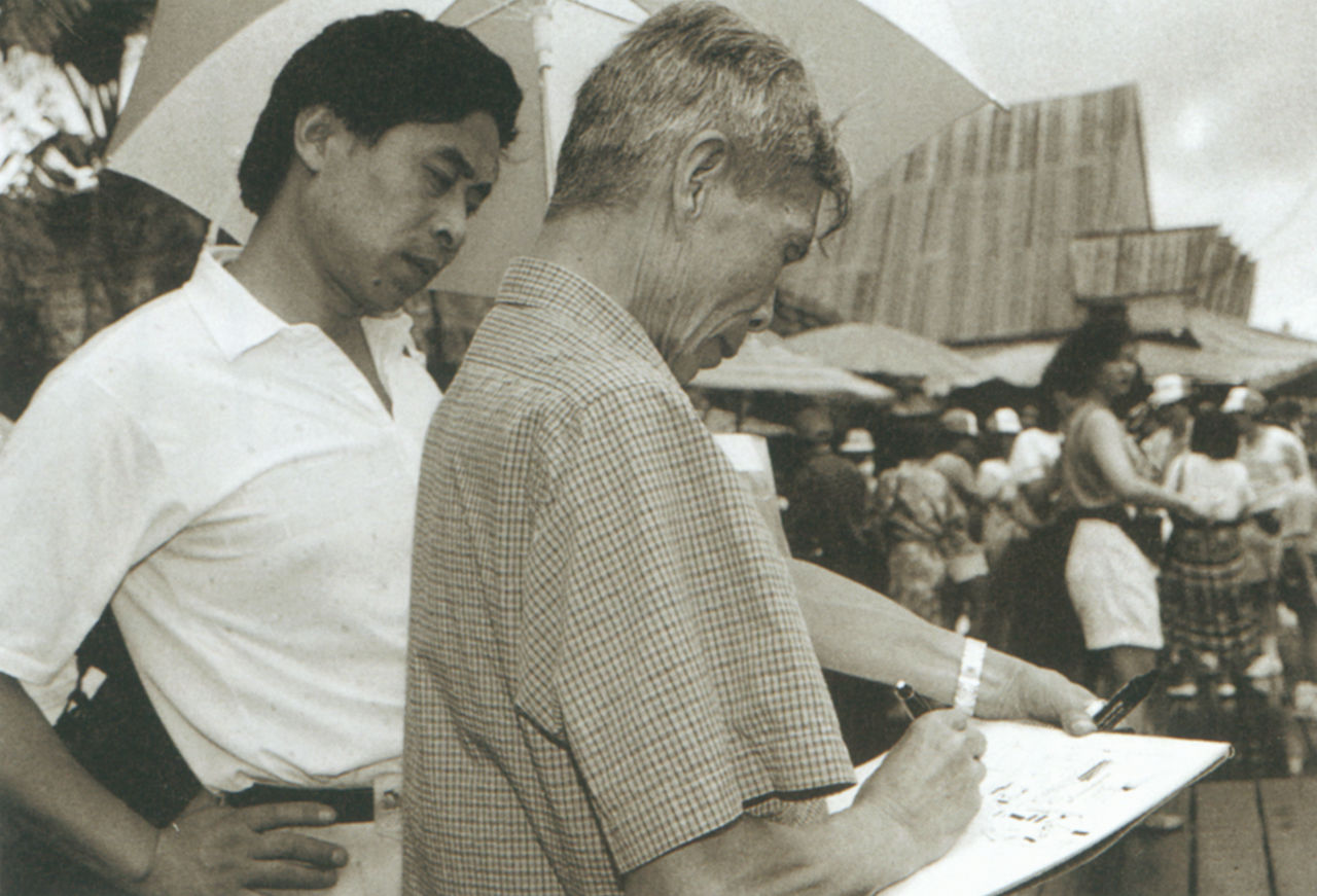 Photograph of Wu Guanzhong sketching at the Daliang Mountains, Sichuan