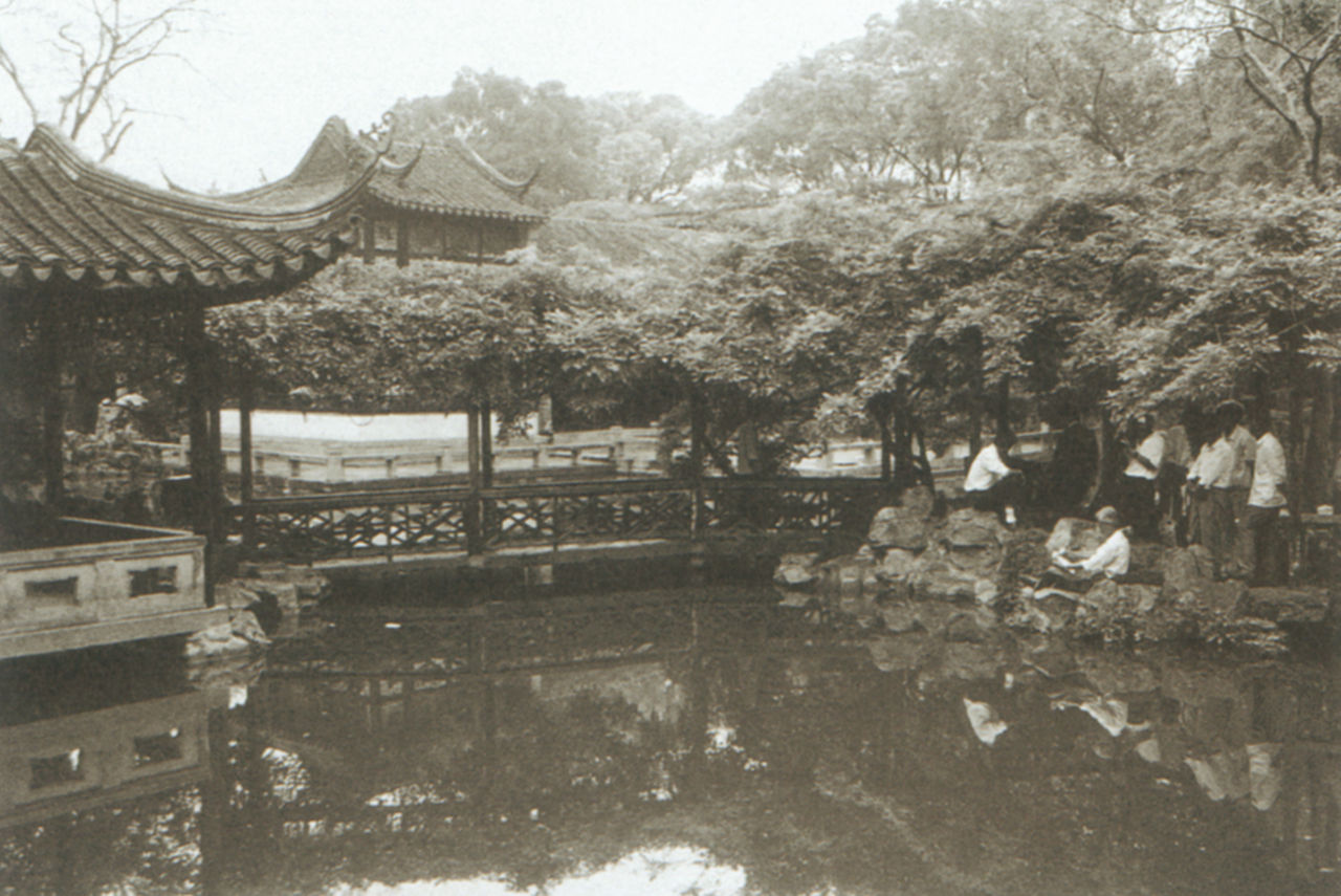 Photograph of Wu Guanzhong sketching at the Humble Administrator's Garden, Suzhou
