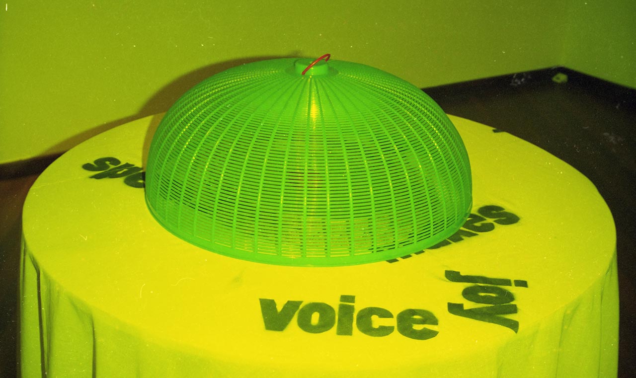 Photographic documentation of "She and her Dishcover" by Amanda Heng at the Singapore Art Museum in 2000