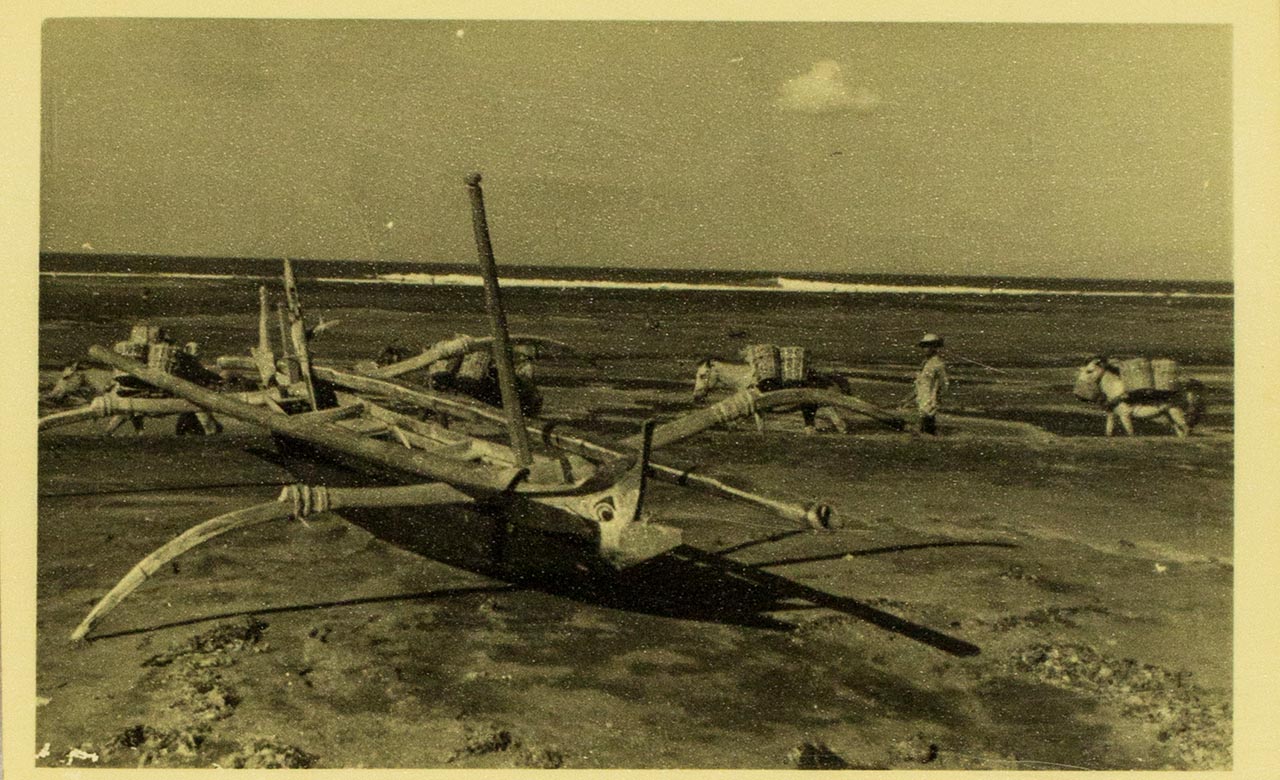 Outrigger boat on beach in Bali
