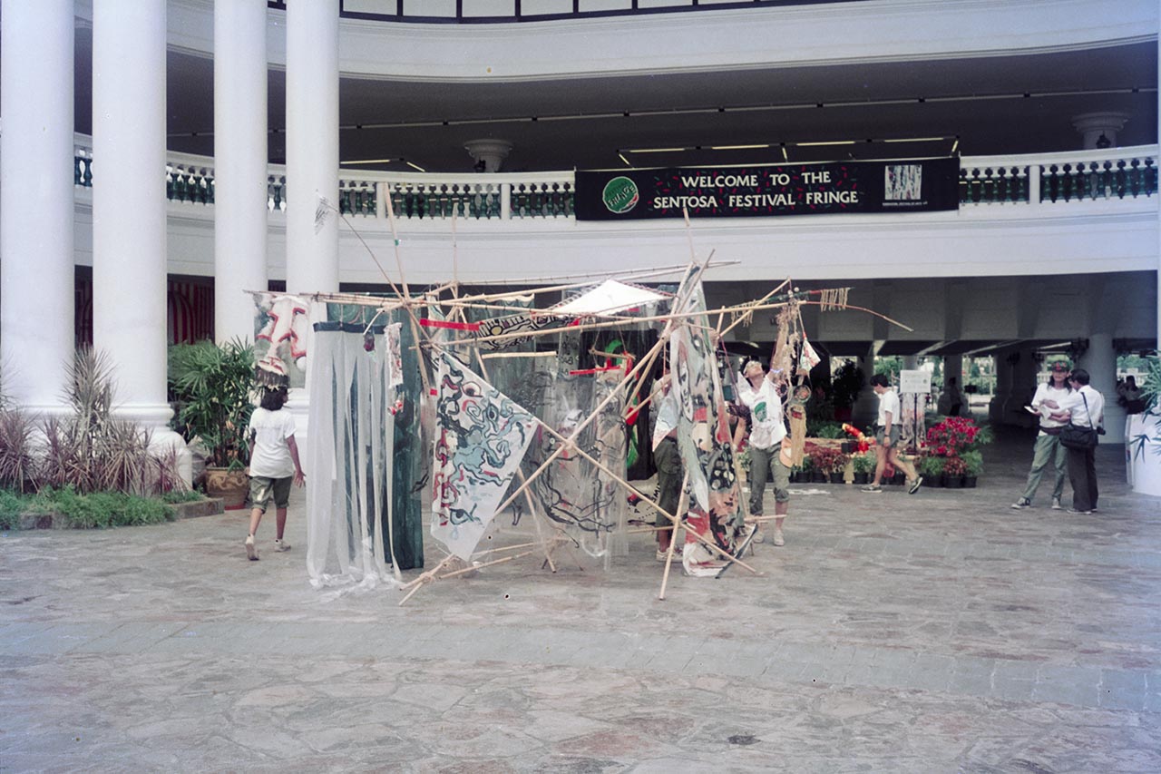 Photographic documentation of the group performance by the Art Commandos at the Sentosa Ferry Terminal