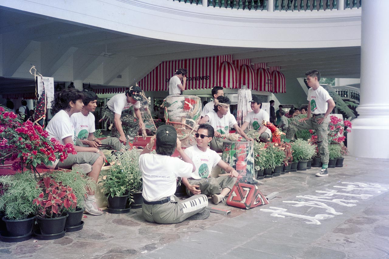 Photographic documentation of the group performance by the Art Commandos at the Sentosa Ferry Terminal