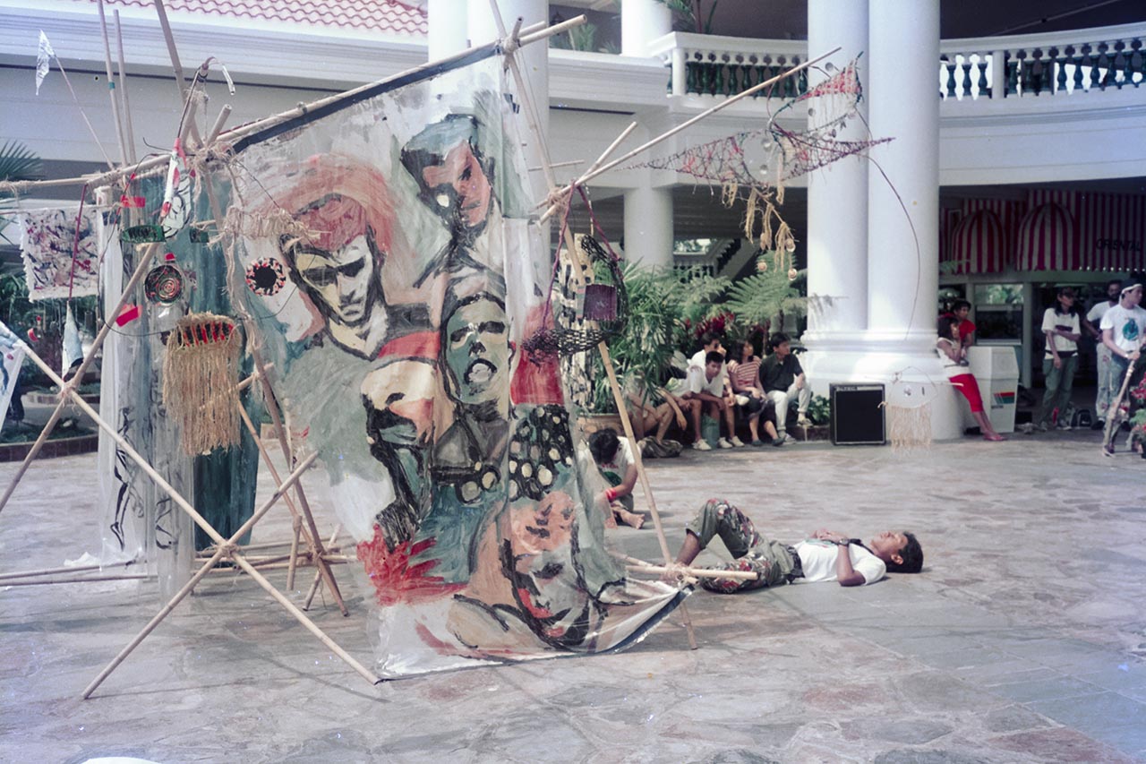 Photographic documentation of the group performance by the Art Commandos at the Sentosa Ferry Terminal