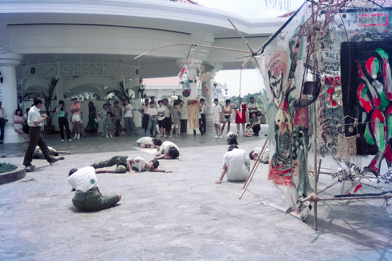 Photographic documentation of the group performance by the Art Commandos at the Sentosa Ferry Terminal