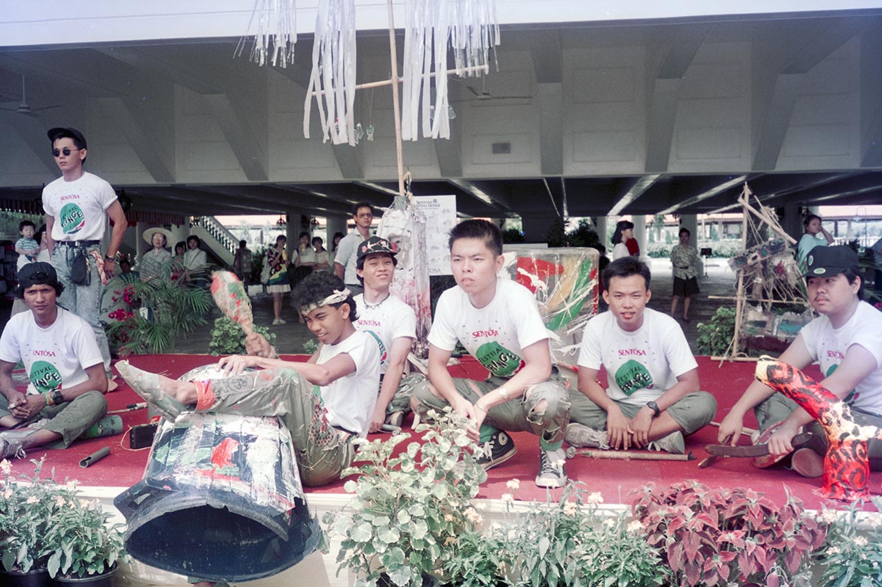 Photographic documentation of the group performance by the Art Commandos at the Sentosa Ferry Terminal
