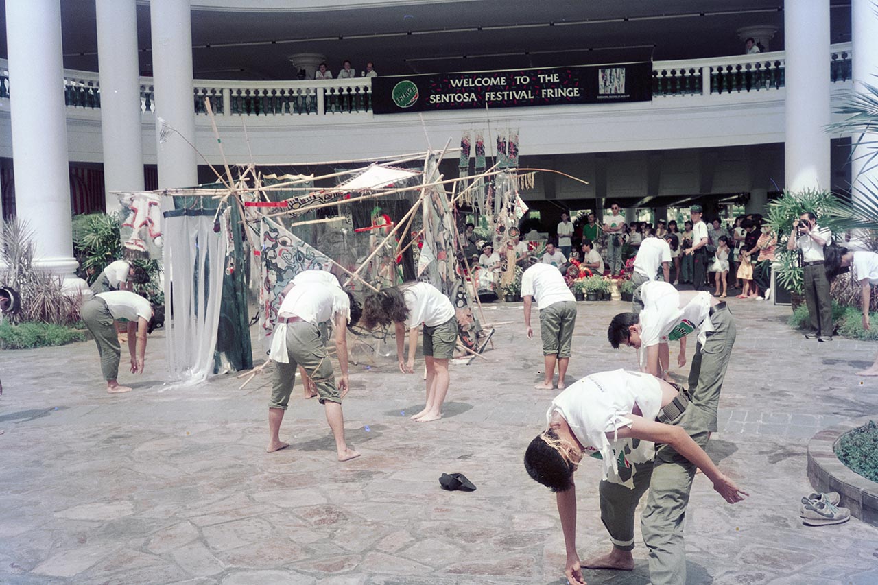 Photographic documentation of the group performance by the Art Commandos at the Sentosa Ferry Terminal