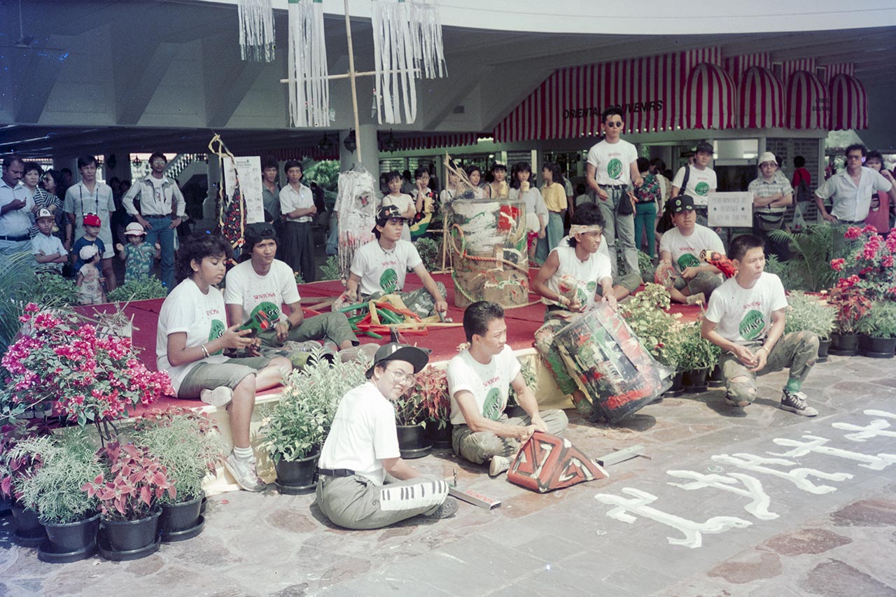 Photographic documentation of the group performance by the Art Commandos at the Sentosa Ferry Terminal