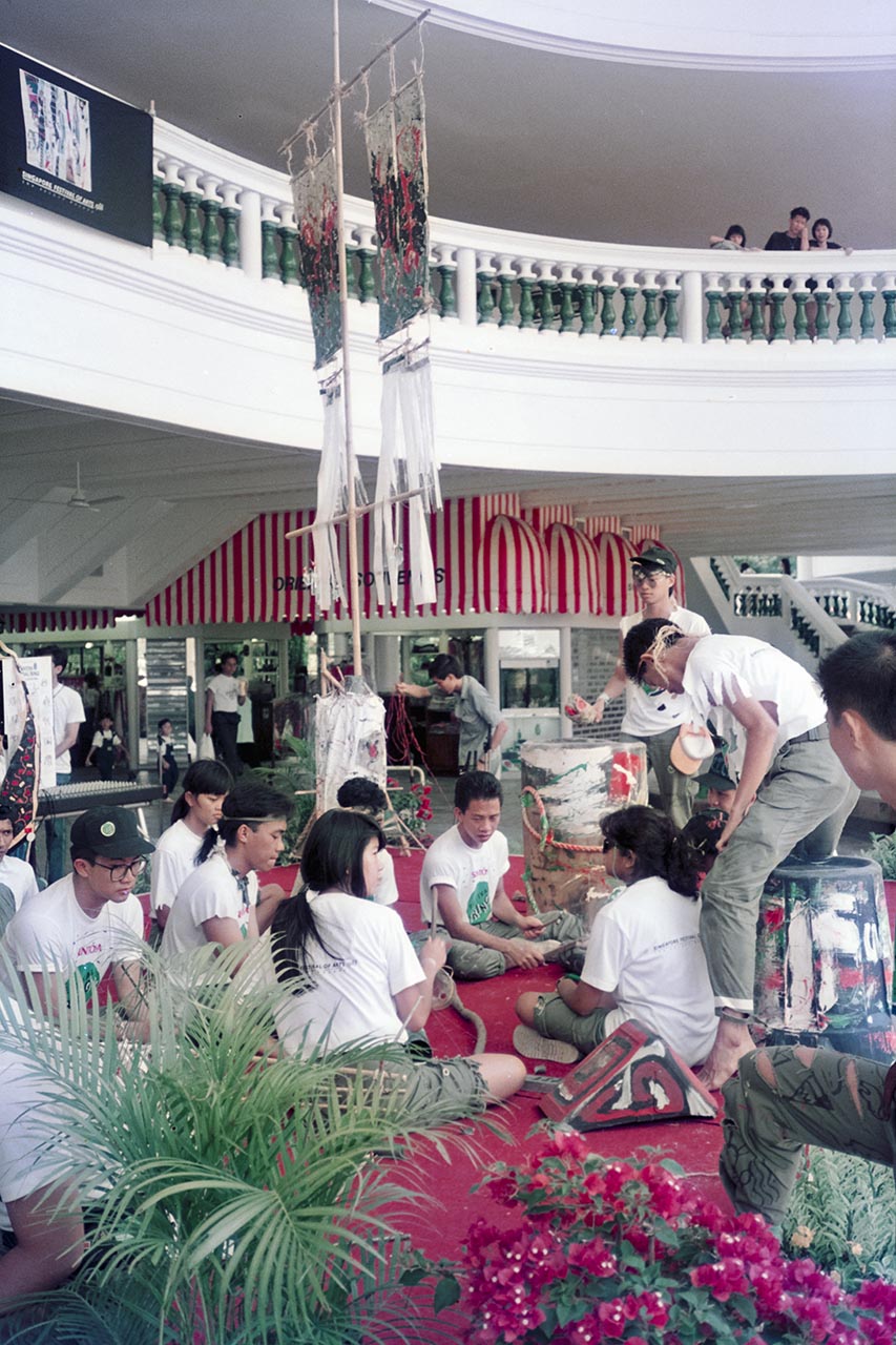 Photographic documentation of the group performance by the Art Commandos at the Sentosa Ferry Terminal