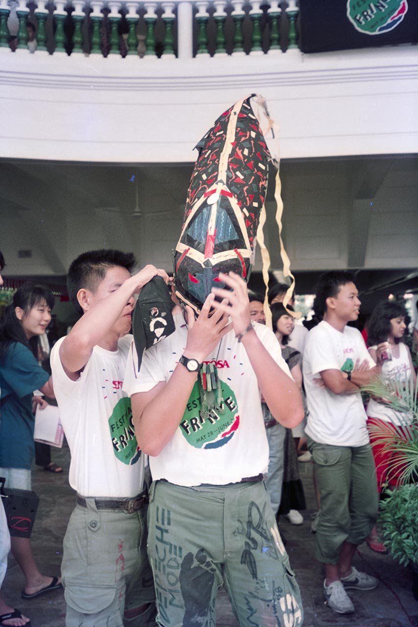 Photographic documentation of the group performance by the Art Commandos at the Sentosa Ferry Terminal
