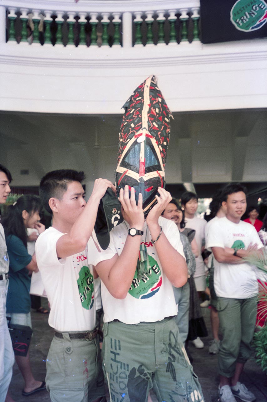 Photographic documentation of the group performance by the Art Commandos at the Sentosa Ferry Terminal
