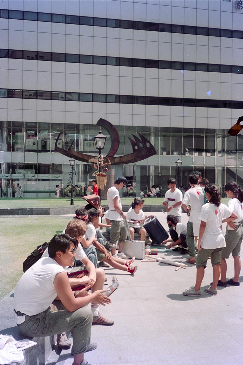 Photographic documentation of the group performance by the Art Commandos at Raffles Place