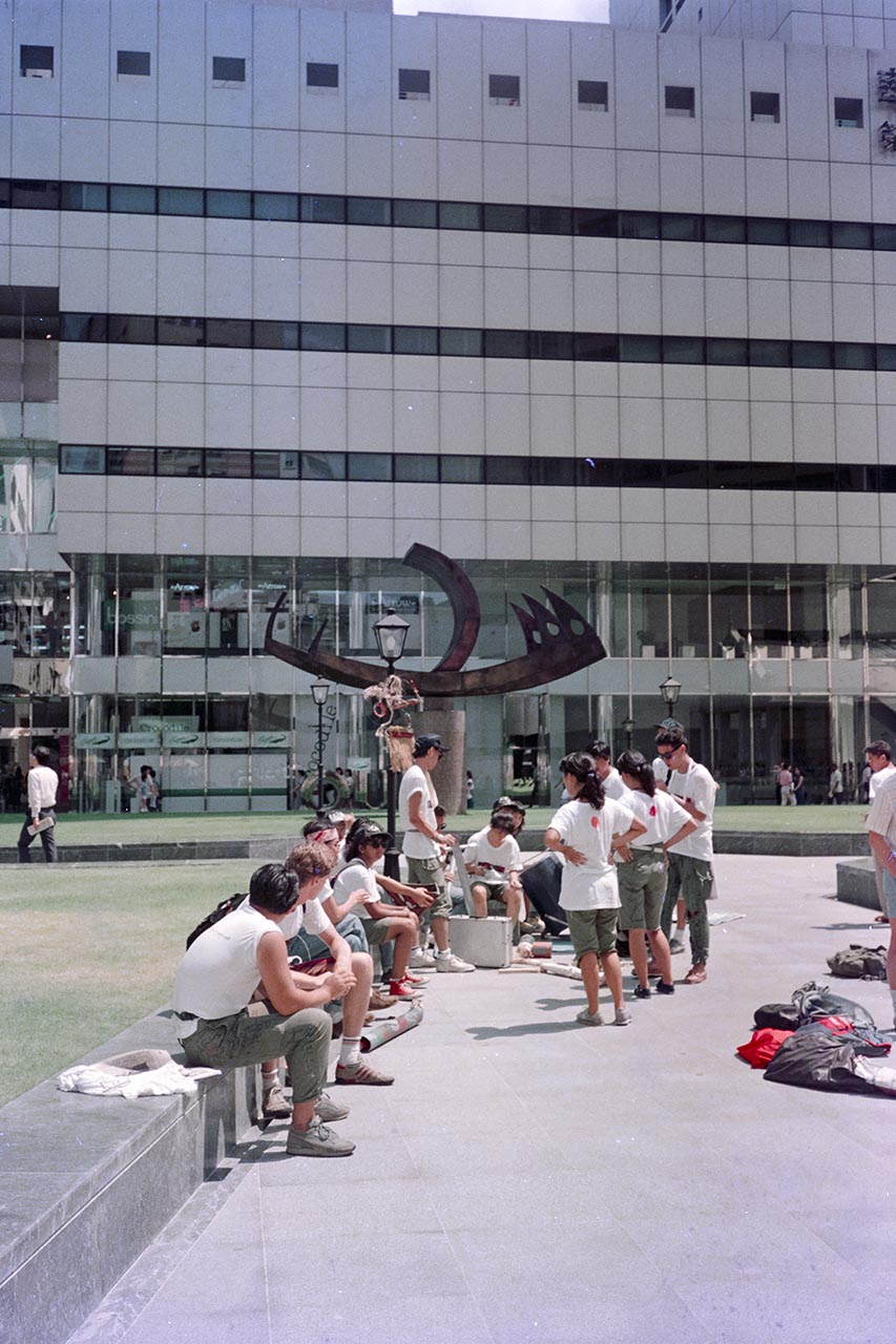 Photographic documentation of the group performance by the Art Commandos at Raffles Place