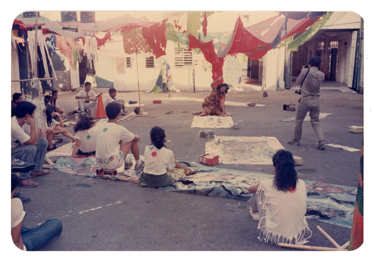 Photographic documentation of Lut Ali's performance at the Former St Joseph's Institution