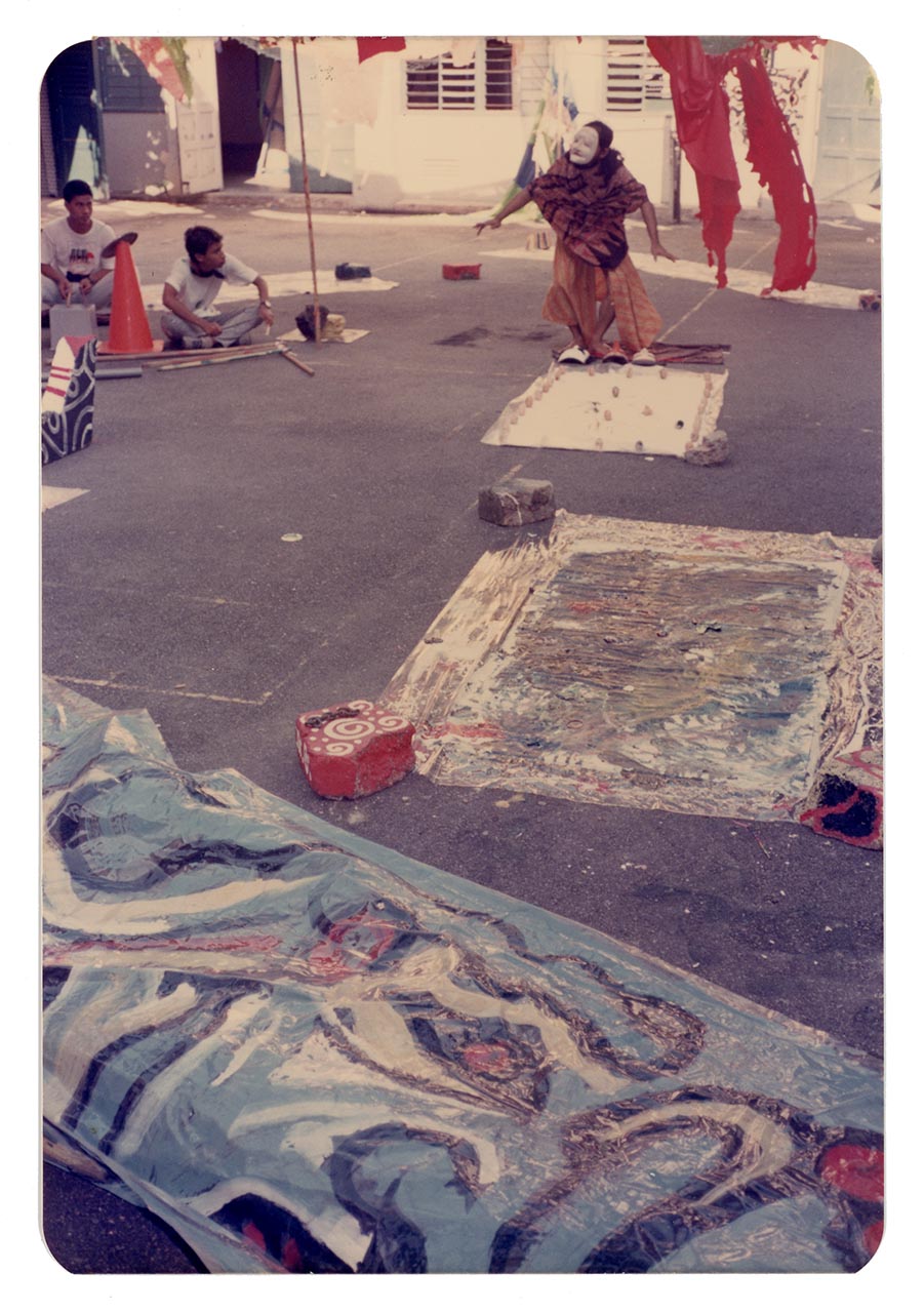 Photographic documentation of Lut Ali's performance at the Former St Joseph's Institution