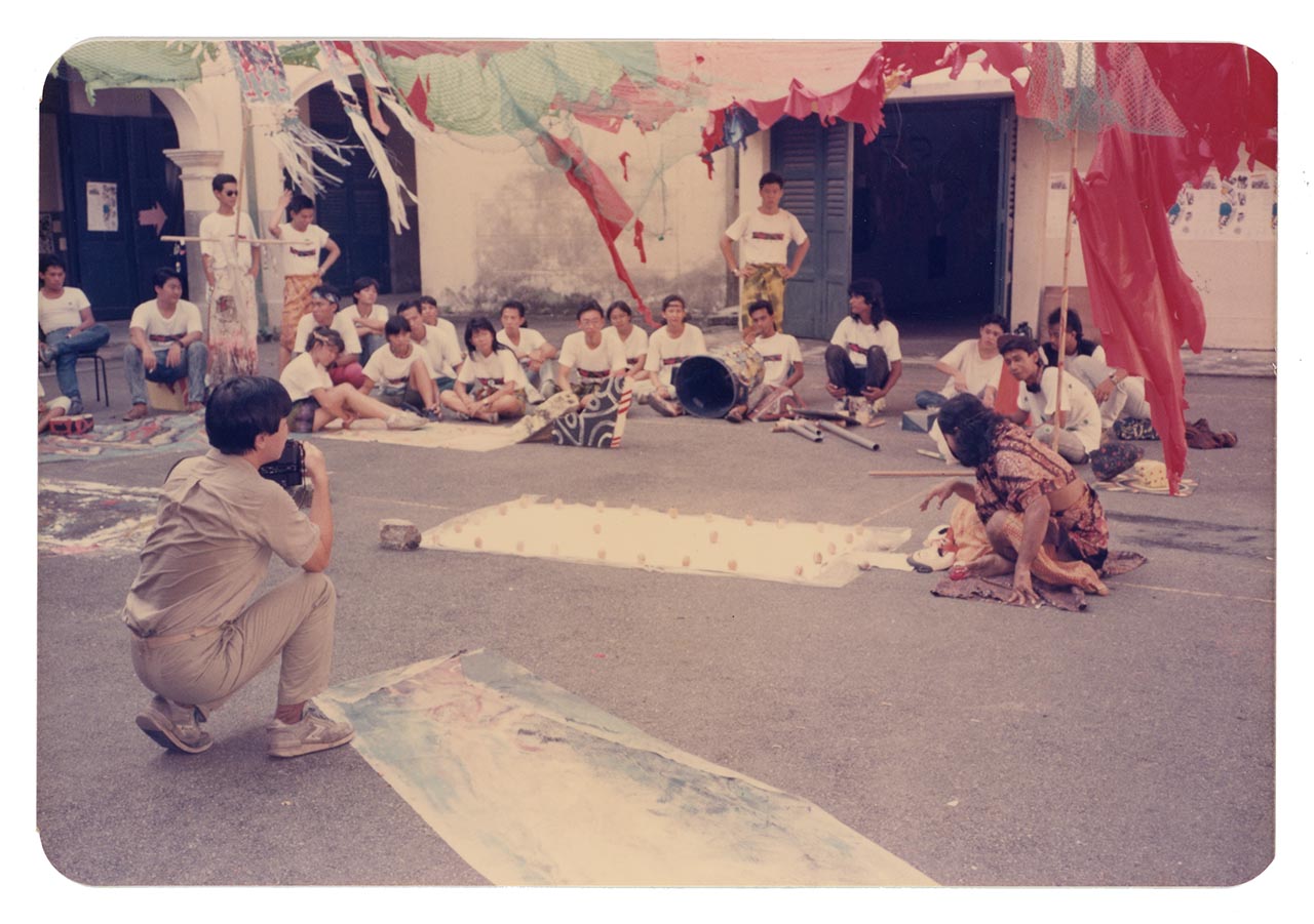 Photographic documentation of Lut Ali's performance at the Former St Joseph's Institution