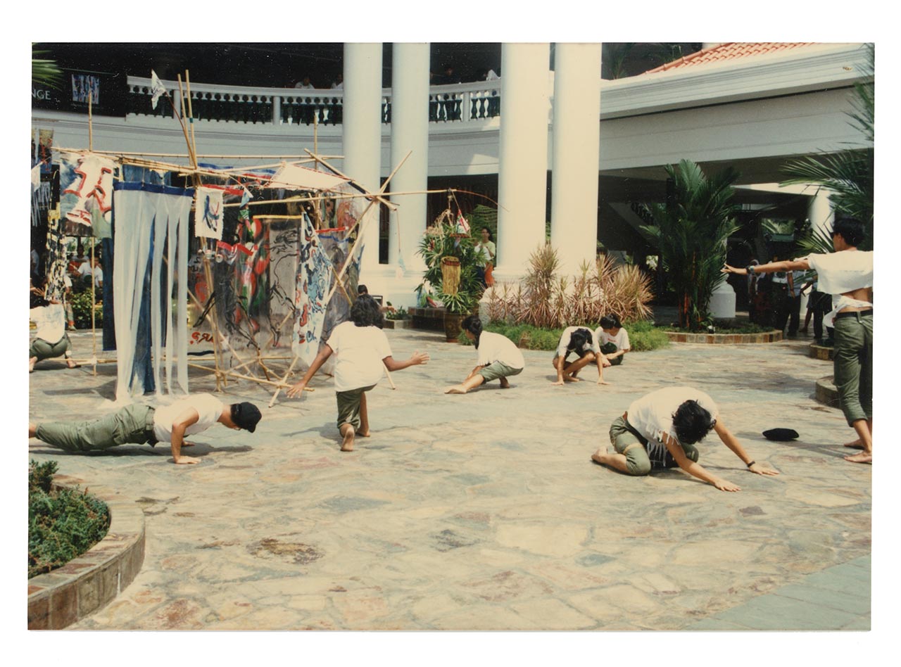Photographic documentation of the group performance by the Art Commandos at the Sentosa Ferry Terminal