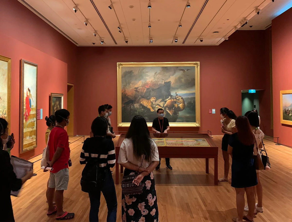 <i>Art For Us</i> participants in UOB Southeast Asia Gallery 2, on an artwork tour of <i>Between Declarations and Dreams: Art of Southeast Asia from the 19th-Century.</i>