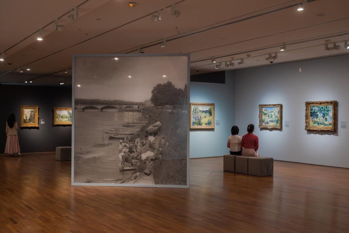 Exhibition space with Impressionist paintings on display