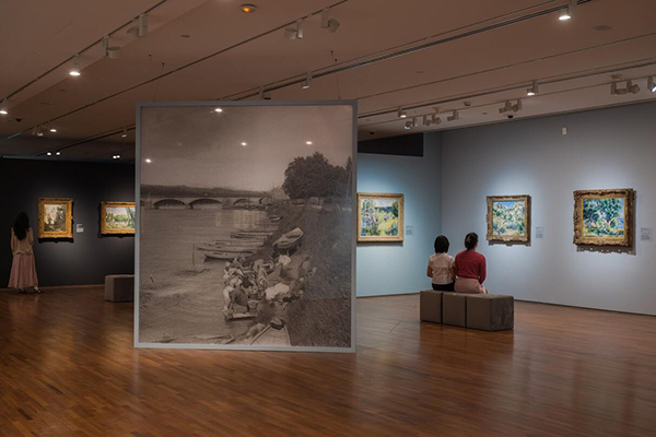 Exhibition space with Impressionist paintings on display