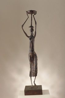 Statue of a Woman Carrying Offerings On Her Head