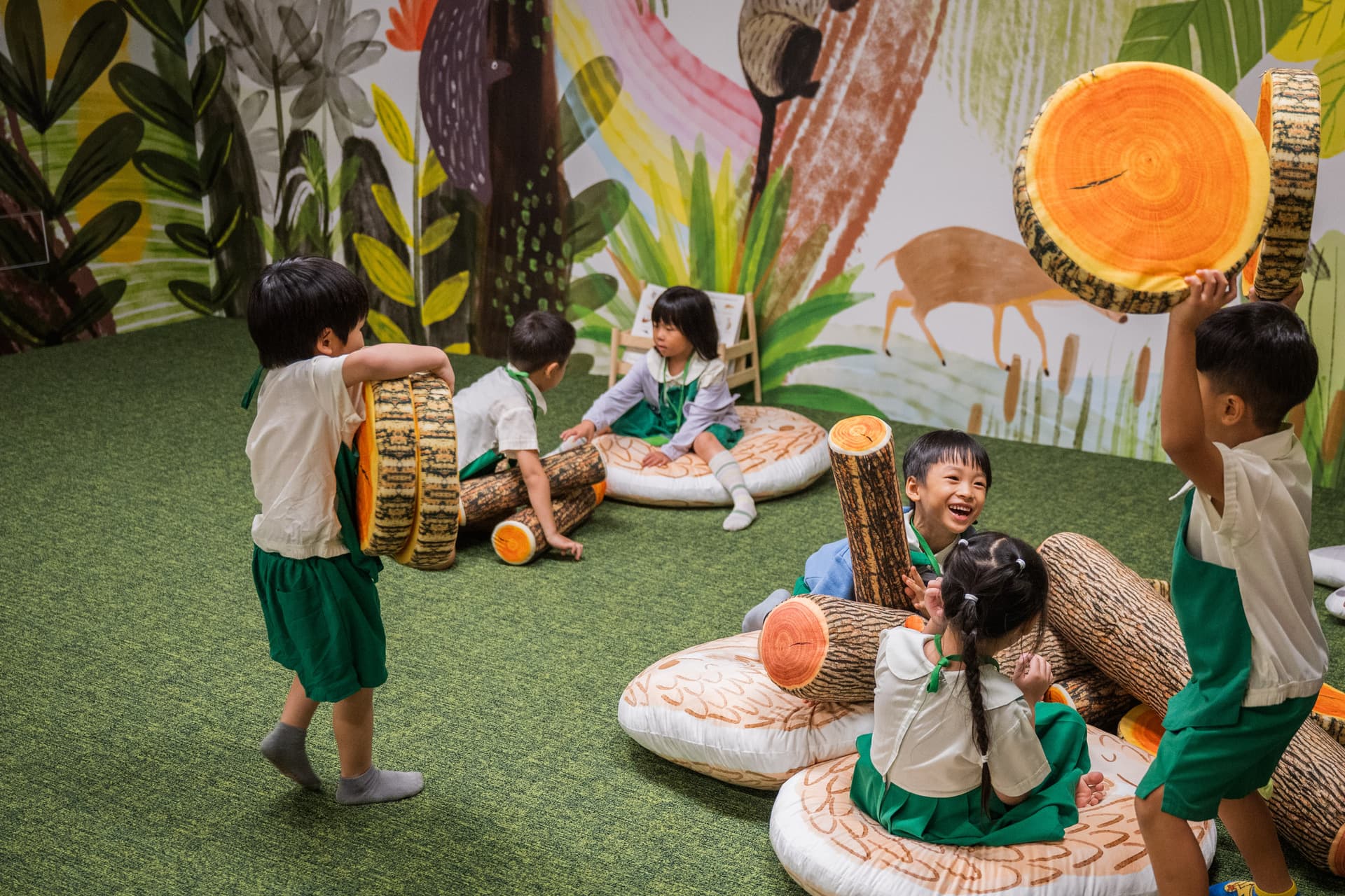 Kids playing at the art installation, Peace Forest, part of the When Art Meets Nature exhibition at the Keppel Centre for Art Education