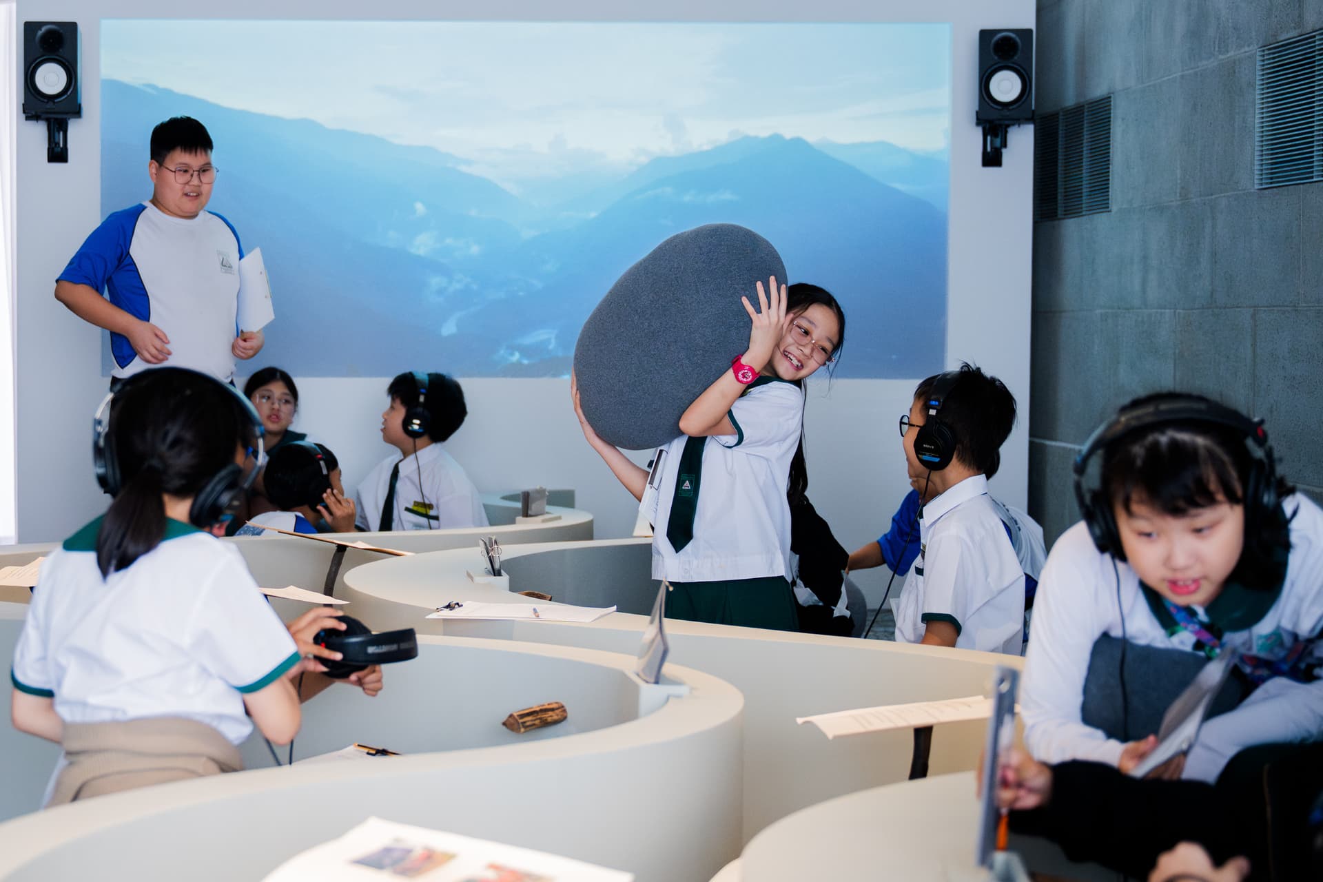 Teens exploring Where the River Runs, an interactive installation part of When Art Meets Nature