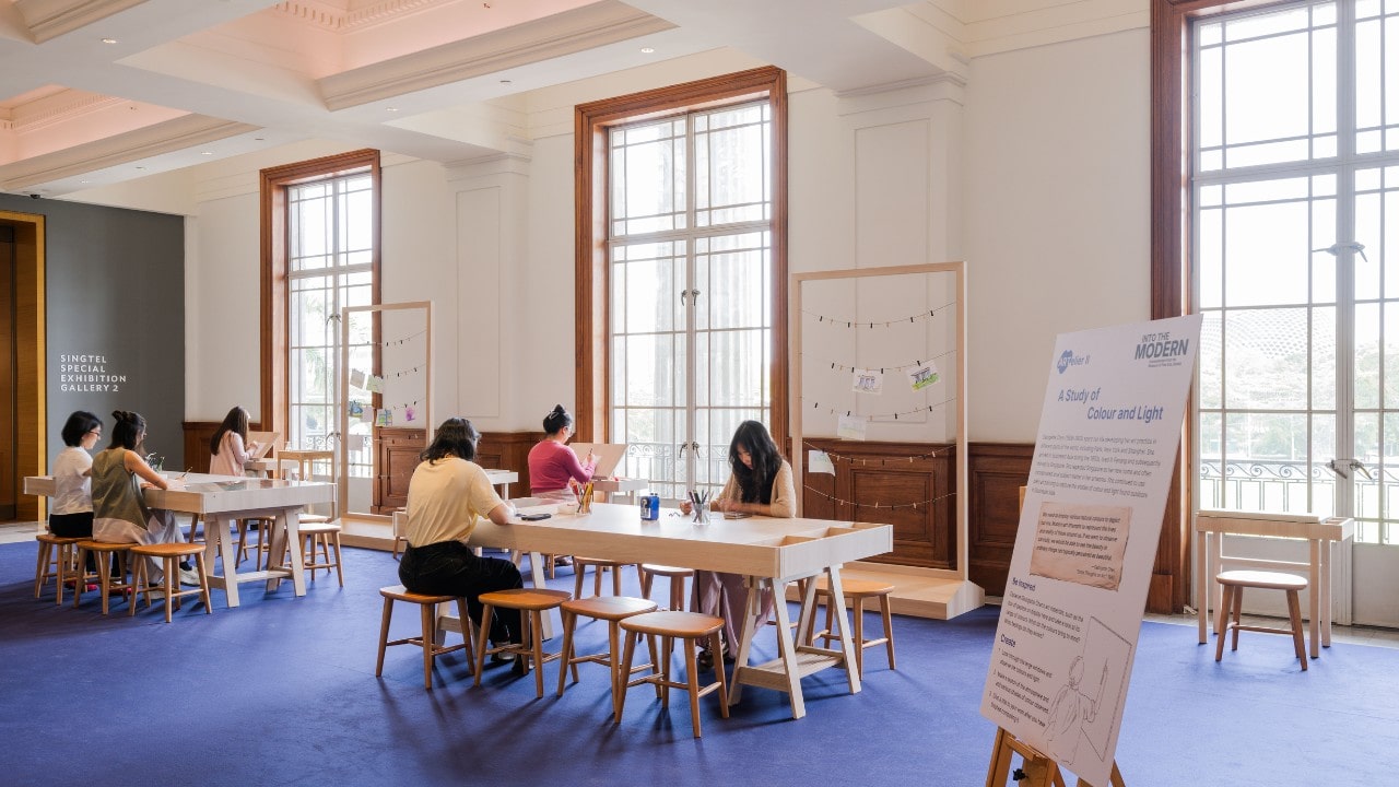 An Artelier activity station in between galleries at the Into the Modern exhibition, featuring activities related to and inspired by Impressionist techniques