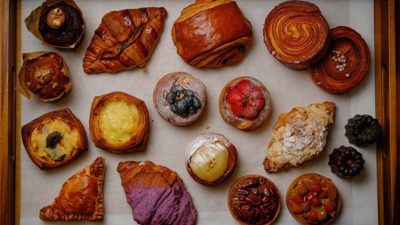 A variety of pastries served up at Bakery Brera, featuring croissants, macarons and sandwiches.
