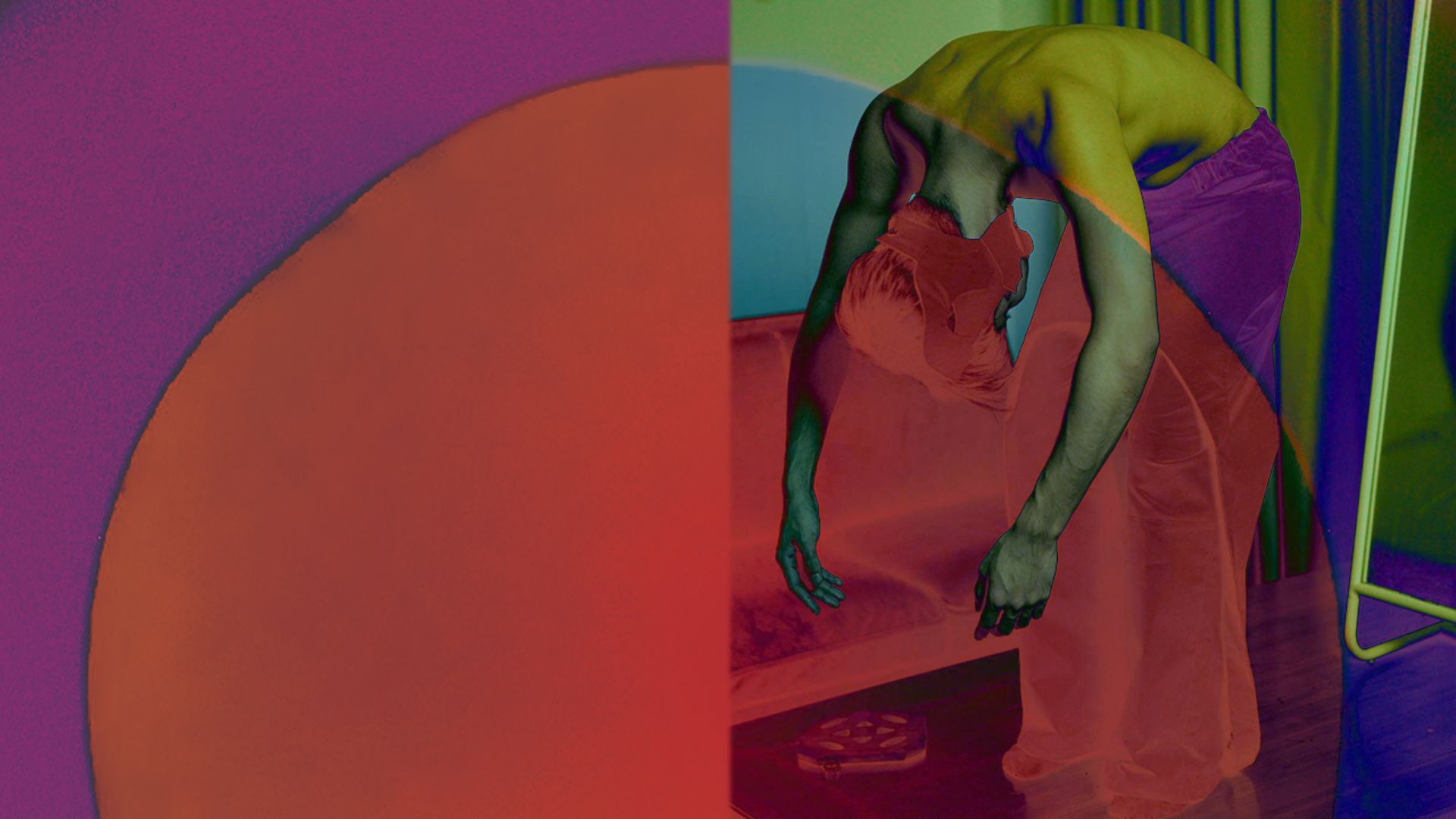 A man bends over a couch, engaged in a performance, showcasing physical expression and movement.